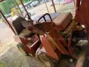 Ditch Witch ditching machine with backhoe and chain trencher