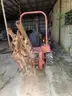 Ditch Witch ditching machine with backhoe and chain trencher