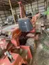 Ditch Witch ditching machine with backhoe and chain trencher