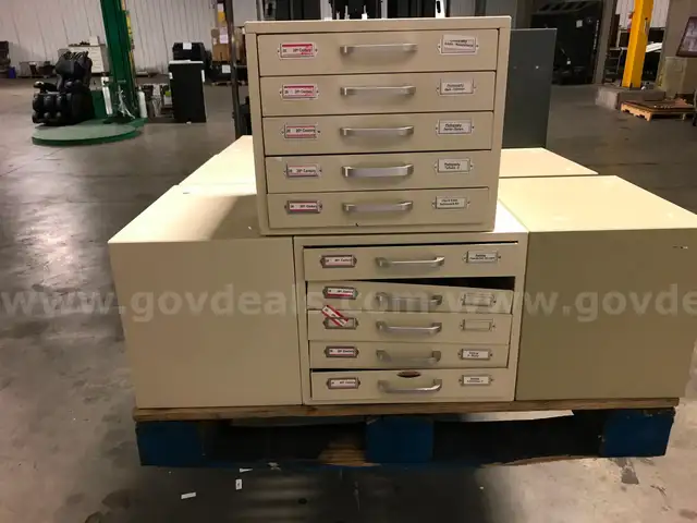 LOT OF NINE  SLIDE FILE CABINETS ON ONE PALLET.