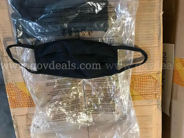 LOT OF BLACK CLOTH FACE MASKS ON ONE PALLET.