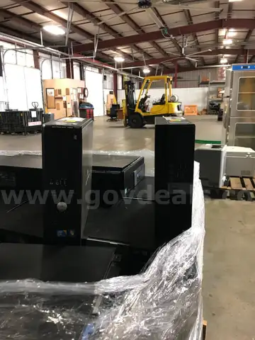 LOT OF COMPUTERS, PRINTERS AND MISC. ITEMS ON TWO PALLETS.