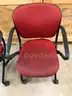 Set of 81 Red KI Folding Chairs with Casters and Armrests