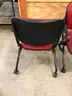 Set of 81 Red KI Folding Chairs with Casters and Armrests