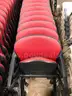 Set of 81 Red KI Folding Chairs with Casters and Armrests