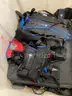 Bin of Various Rehab Harnesses