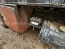 1994 Ford CF7000 Flatbed Truck with 1000 Gallon Water Tank