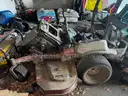 2 LAWN MOWERS (SOLD AS IS FOR PARTS ONLY)