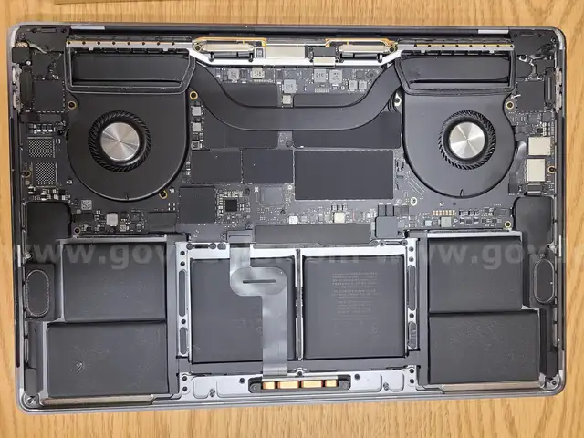 1 Apple Laptop