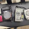 1 Box of Old Various Cameras