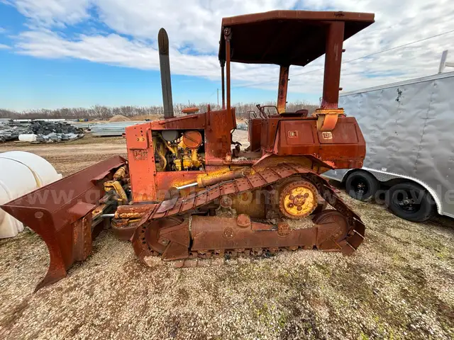 Caterpillar Bull Dozer was in a fire still runs will need some work.
