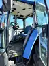 2010 New Holland T5060 2WD Cab Tractor With Side and Rear Flail Mowers