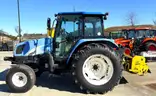 2010 New Holland T5060 2WD Cab Tractor With Side and Rear Flail Mowers