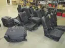 Mixed lot of used seats, consols, panels, and parts - Chevrolet, Ford