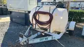 Trailer with water tank, concrete saw .. (lot 1125)