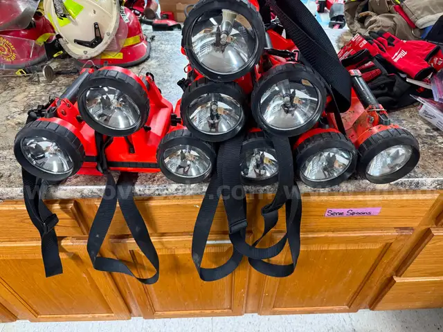 9 Streamlight light boxes.      Flashlight