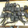 LOT OF 24 BASES AND 21 CHARGERS FOR PORTABLE RADIOS