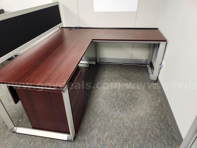 L shaped desks in Mahogany with a privacy screen