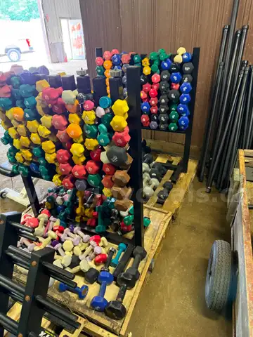 Lot of 6 weight racks and assortment of hand weights