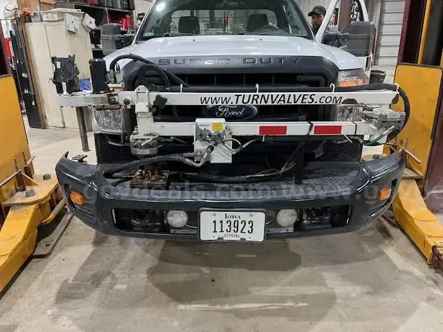 Water main valve exerciser