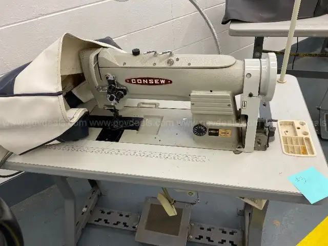 Consew Sewing Machine Model # 339RB-4 and table. (#3)