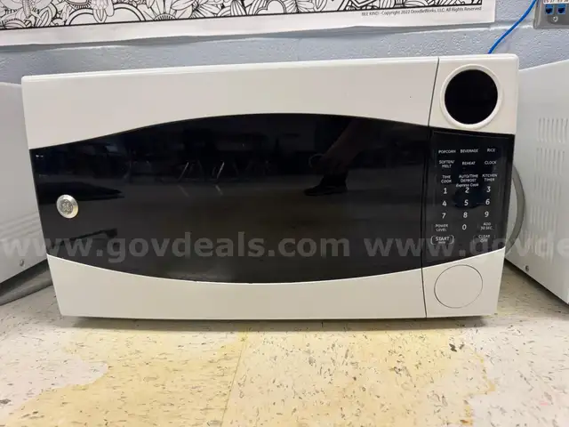 A Lot of 5 Microwaves