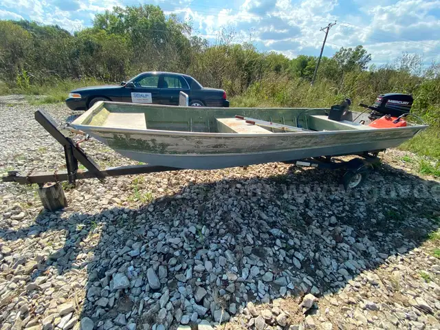 John Boat with Mercury 25hp Motor and Trailer