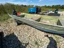 John Boat with Mercury 25hp Motor and Trailer