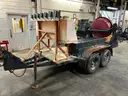 Concrete mixer trailer with water tank