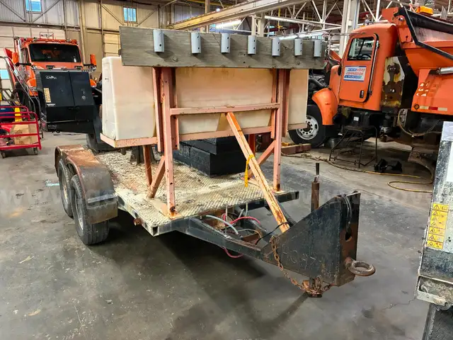 Concrete mixer trailer with water tank