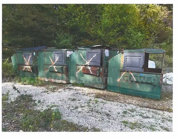 Six (6) 8 cubic yard metal dumpsters