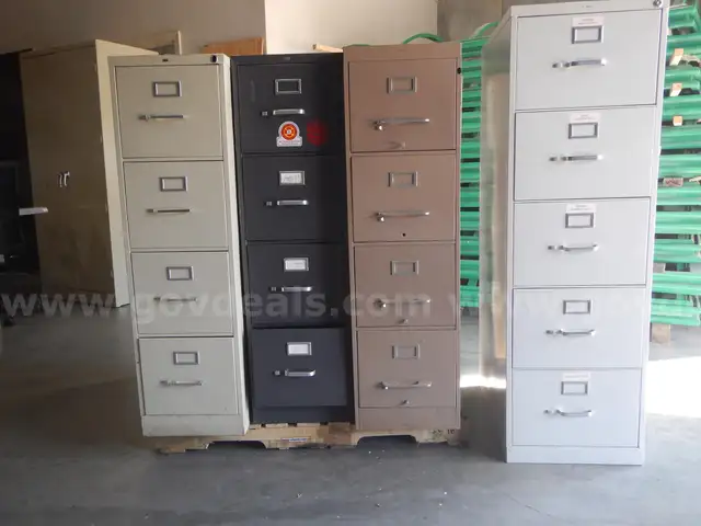 (8) Metal File Cabinets