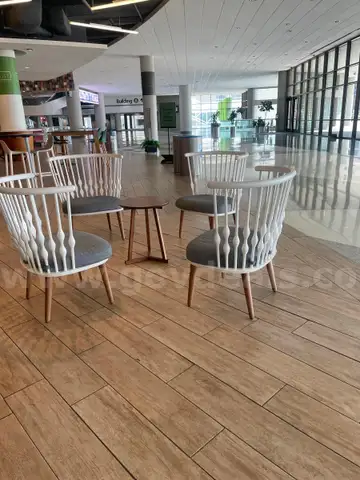 4 high back chairs and a bistro table