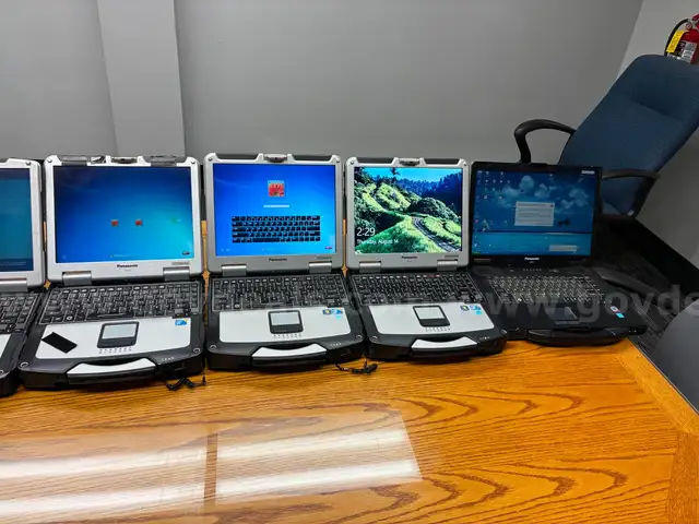 Lot of 8 Toughbooks with models CF-29, CF-30, CF-31, and CF-52.