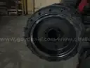 Solid skid steer tires/wheels