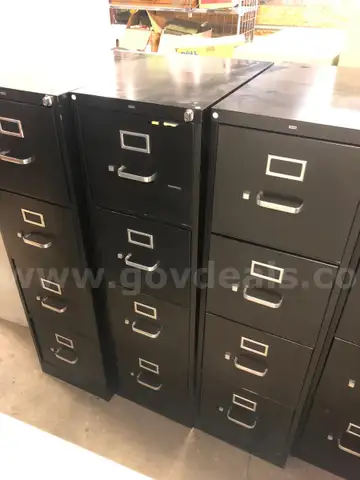 Three 4 Drawer File Cabinets