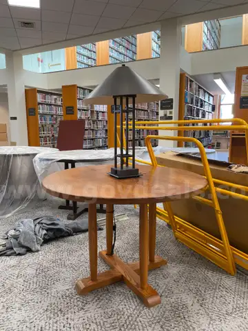 Table with attached lamp