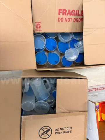 Two boxes of drink/snack pitchers