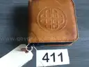LEATHER CD CASE FILLED WITH CDS OF CURRENT/TRENDING ARTISTS (AUC411)