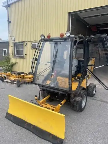 Hustler Mower with snow blade and cab