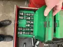 Metal rolling toolbox containing various tools