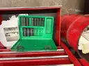 Metal rolling toolbox containing various tools