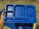 400+ Royal Blue Cafeteria Trays with 2-Storage Carts (SOLD AS IS).