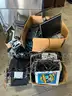 Lot of monitors, projector, various cables.