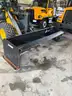 10-FOOT SNOW PUSHER WITH RUBBER CUTTING EDGE AND SKID STEER QUICK ATTACHMENT