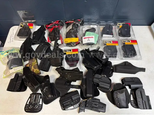 Lot of Police Holsters and Flashlights