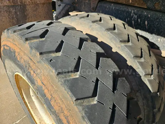 2009 STERLING L 8500 WITH LOADALL SELF LOADING BUCKET