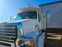 2009 STERLING L 8500 WITH LOADALL SELF LOADING BUCKET