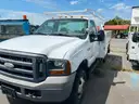 2005 FORD F 350 diesel 4 wheel drive with tool bed