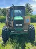 2010 John Deere 6430 tractor with boom mower